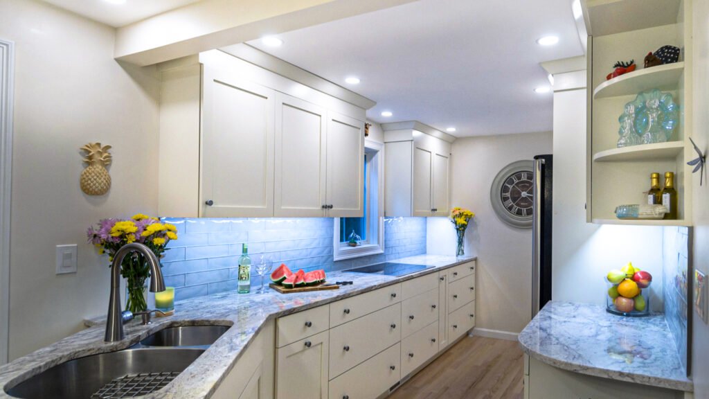 Designing a narrow white kitchen