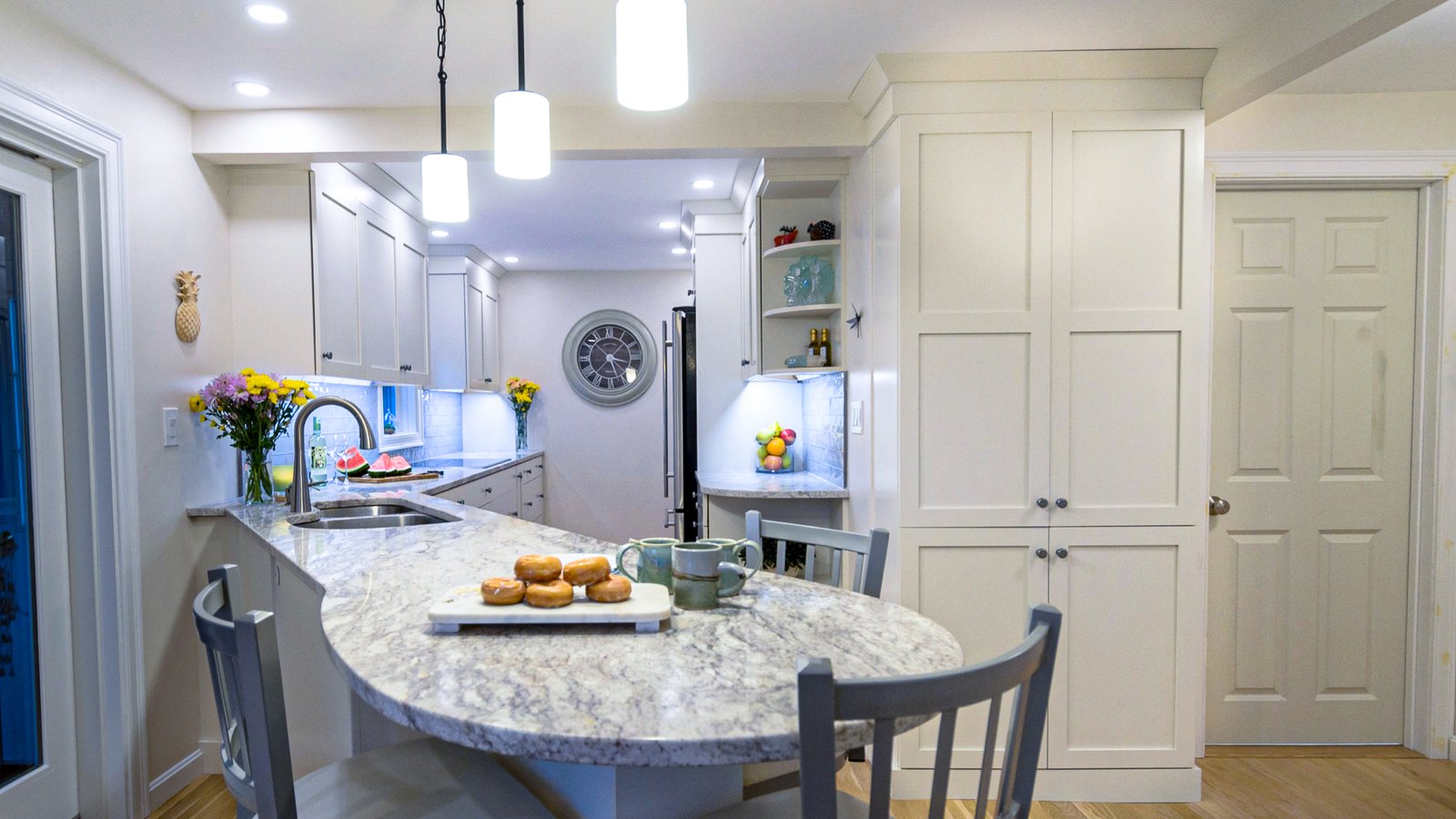 Designing a narrow white kitchen
